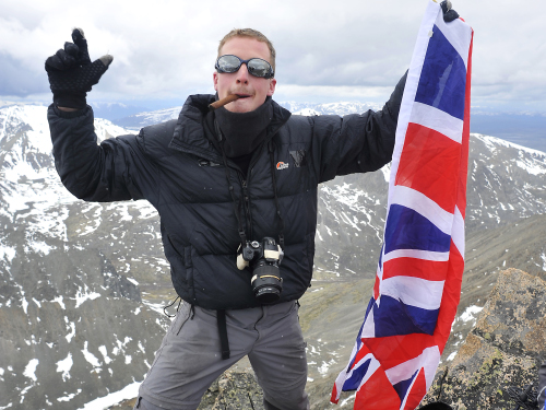Summit pose on 'London Bridge', Russian Altai - David Tett