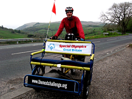 Tim and rickshaw coming off the 1,400ft A6 summit by Shap