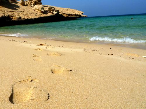 Footprints in the sand, Qantab Beach, Muscat, Oman