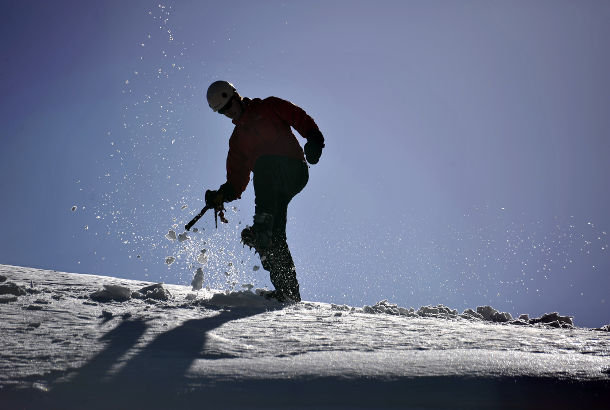 Silhouetted climber on snow in Siberia (Photo: David Tett)