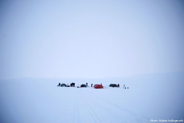 Distant tents in the snow (Photo: Robert Hollingworth)